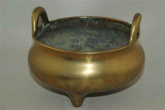 A large Chinese bronze tripod censer, Ding, Xuande six character mark, probably 18th / 19th century, diam. 20.5cm, weight 2030g.